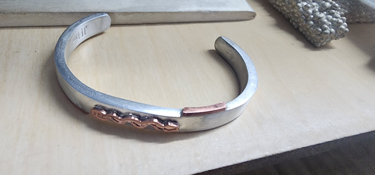 Silver cuffs and cooper customized art on each and potential digitalcollectables soon... [need to email me if you want one nothing available through the app] by Artist #TYMED